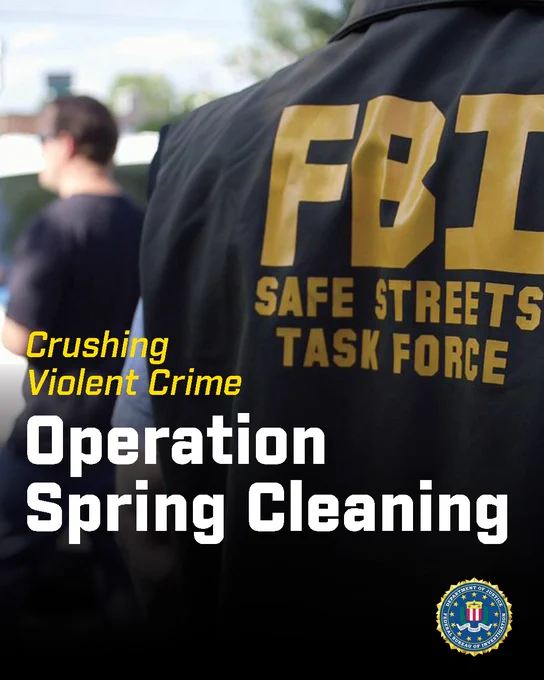FBI Safe Streets Task Force agent in jacket during Operation Spring Cleaning targeting violent crime.