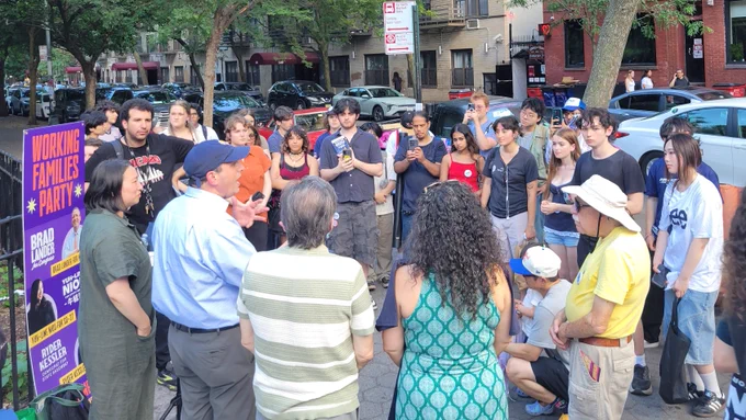 Speaking to the large group of canvassers.