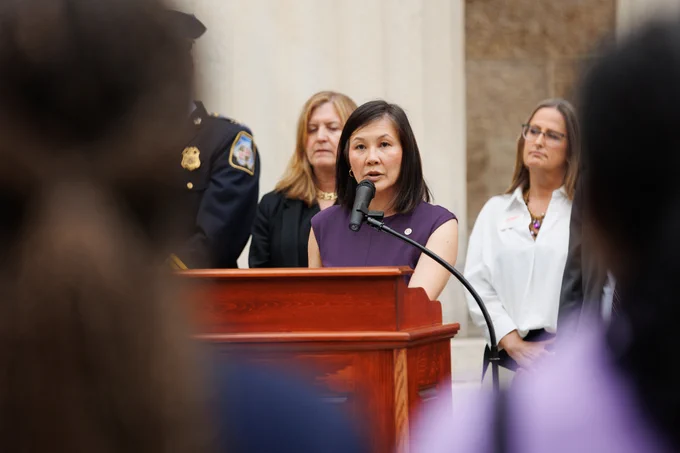 Photo of Department of Aging Director Heang Tan speaking at the press conference.