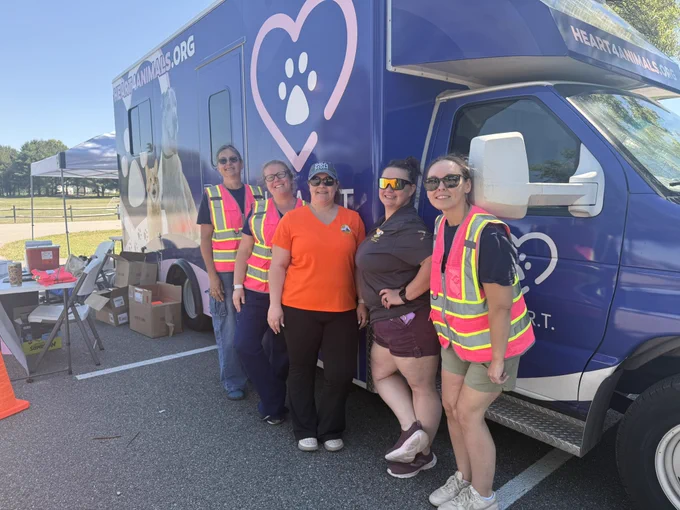 5 women standing in front of a van at Church Hill Park
