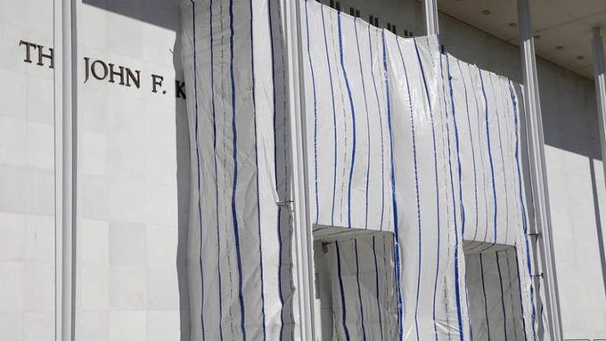 Picture of tarp covering the Kennedy Center facade to protect tiny dick Trump's giant ego. #FuckTrump