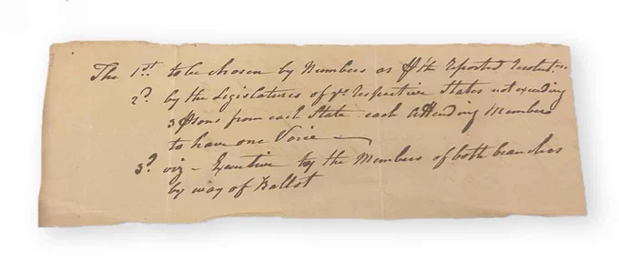 Handwritten historical document with cursive text outlining voting procedures on aged paper.