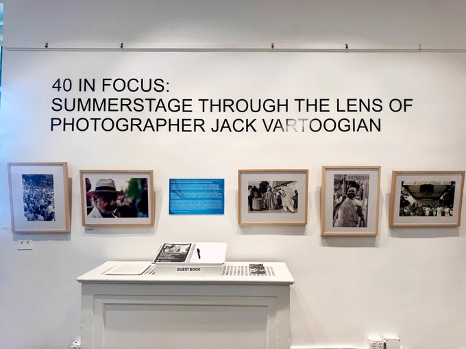 A wall with photographs and the words "40 in Focus"