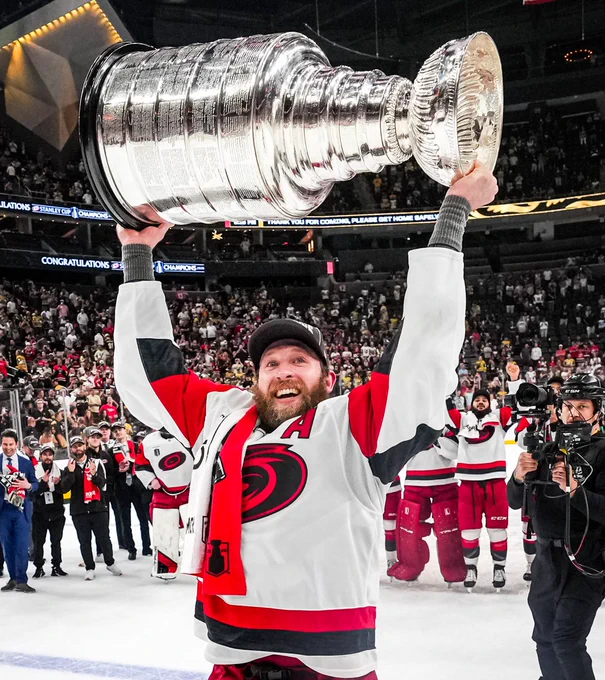 Photo of Jaccob Slavin hoisting the Cup 