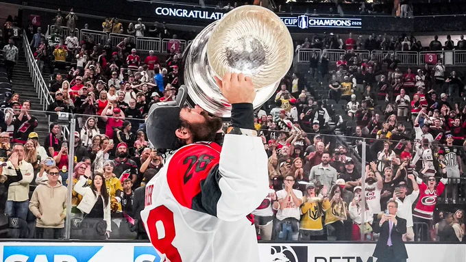 Photo of William Carrier kissing the Cup 