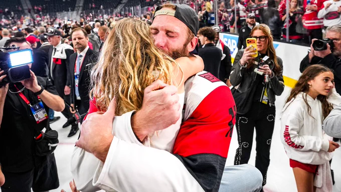 Photo of Jordan Staal hugging his daughter