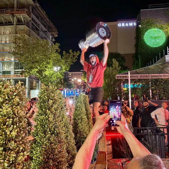 K’Andre Miller lifts the Stanley Cup.