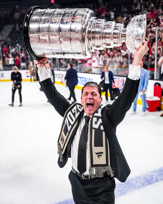 Photo of Rod Brind’Amour lifting the Cup