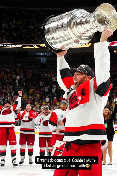 A photo of Taylor Hall lifting the Stanley Cup with text overlaid that reads \"Dreams do come true. Couldn't ask for a better group to do it with\". 