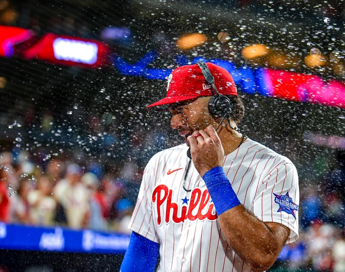 Gabriel Rincones Jr. Is showered with water in his postgame interview