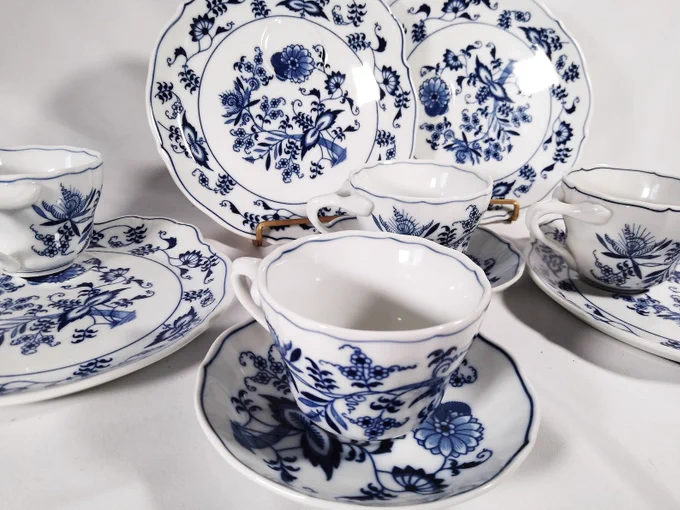 Blue Danube Japan Blue Onion snack plates with matching tea cups and two small saucers in cobalt blue on white porcelain