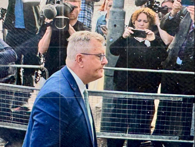 Jeffry Donaldson walking into court in a blue suit