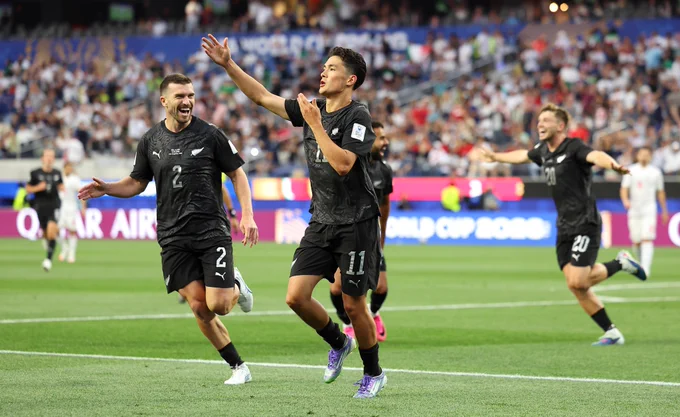 A photo of New Zealand players celebrating.
