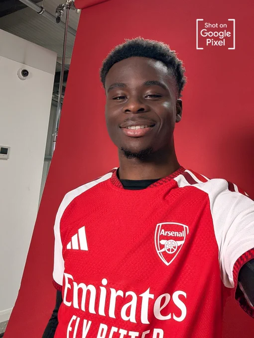 Bukayo Saka takes a selfie in the Arsenal adidas 26/27 Home Shirt. Shot on Google Pixel.