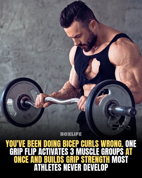 A muscular man is performing bicep curls with an E-Z curl bar, showcasing the importance of grip technique. The mood is motivational and instructional.