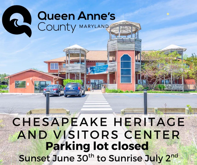 Chesapeake Heritage and Visitors Center building with wooden towers and a closed parking lot sign in Queen Anne's County, Maryland.