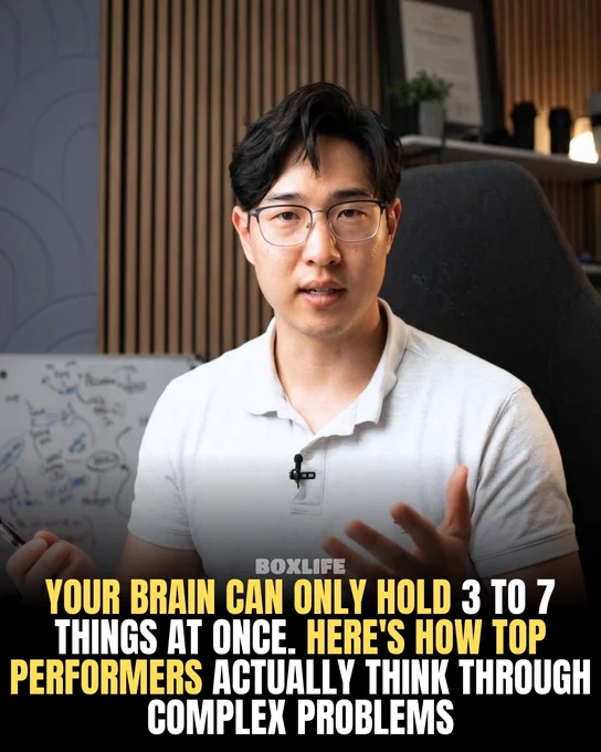 A person in an office explains how top performers handle complex problems. The mood is informative and professional.