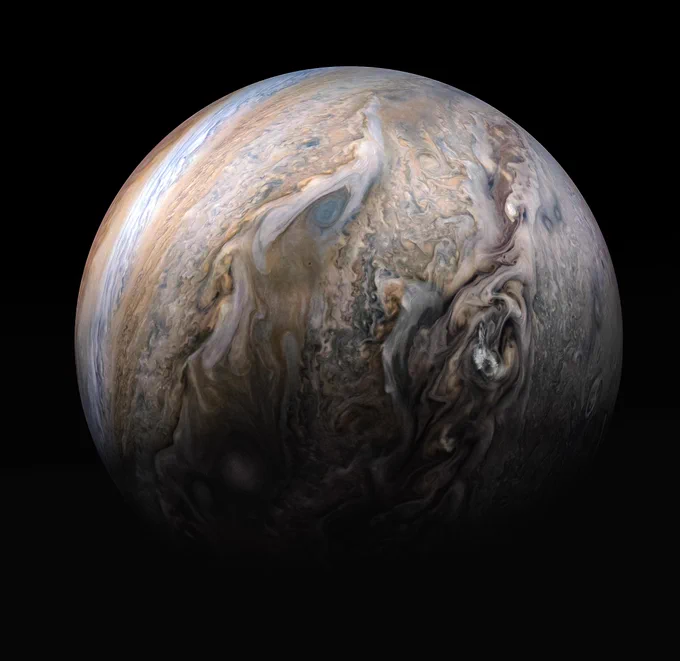 This stunning compilation image of Jupiter's stormy northern hemisphere was captured by NASA's Juno spacecraft as it performed a close pass of the gas giant planet. Some bright-white clouds can be seen popping up to high altitudes on the right side of Jupiter's disk.  Credit: NASA/JPL-Caltech/SwRI/MSSS/Kevin M. Gil