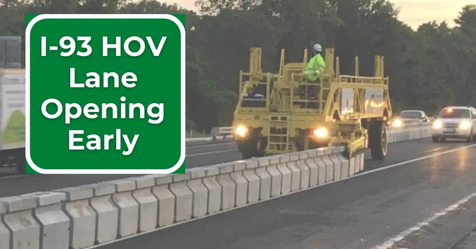 Zipper lane truck opening roadway on I-93. Sign states "I-93 HOV lane opening early"