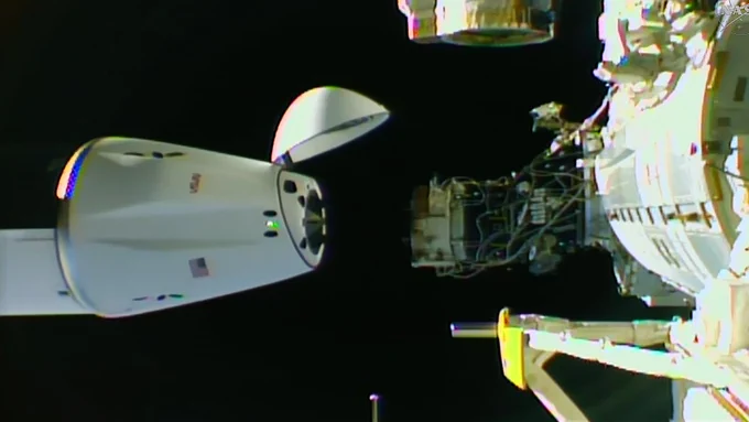 The SpaceX Dragon cargo spacecraft is seen shortly after undocking from the International Space Station's forward port on the Harmony module.