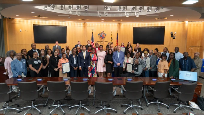 Councilmembers and community members in the Council Hearing Room.