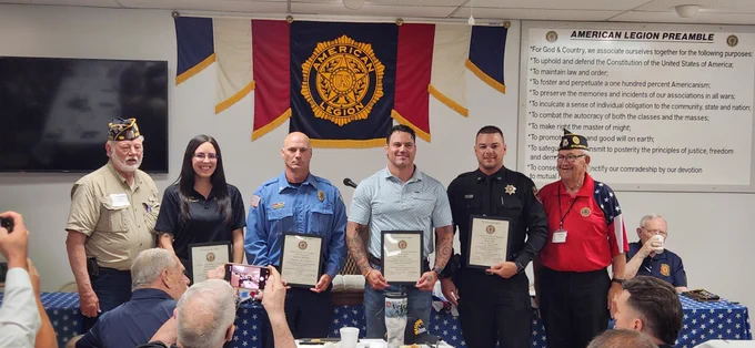 Sgt. Blake O'Dell and others were are pictured holding their certificates after being honored by the Stillwater American Legion Post 129. 