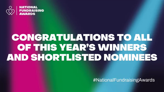 Bright graphic for the National Fundraising Awards with text: “Congratulations to all of this year's winners and shortlisted nominees.” The hashtag #NationalFundraisingAwards is in the corner. Green, pink, and blue colored beams in the background.