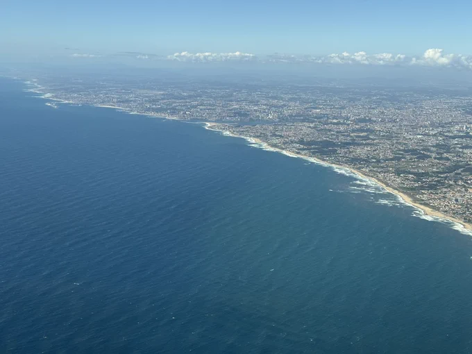 The Portuguese coastline of the mainland during our approach to Porto. Clearly visible is a nearly continuous sand beach, with the Douro estuary a bit further along the coast.