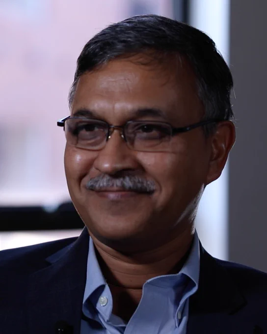 Headshot photo of Debajyoti Sinha.