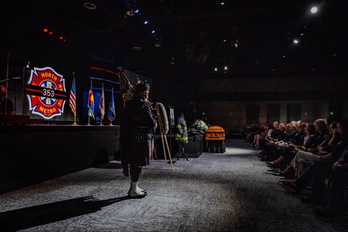 Bagpiper playing at a firefighter funeral