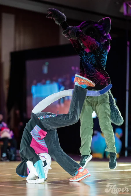 A phot of Lucid and Alter Ego competing in the Furpoc 2025 dance competition taken by Hyper