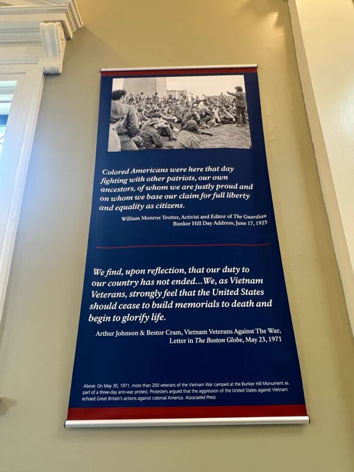 Poster that reads "Colored Americans were here that day fighting with other patriots, our own ancestors, of whom we are justly proud and on whom we base our claim for full liberty and equality as citizens." - William Monroe Trotter, Activist and Editor of the Guardian, Bunker Hill Day Address, June 17, 1925.

"We find, upon reflection, that our duty to our country has not ended...We as Vietnam Veterans, strongly feel that the United States should cease to build memorials to death and begin to glorify life" - Arthur Johnson & Bestor Cram, Vietnam Veterans Against the War, Letter in the Boston Globe, May 23, 1971.