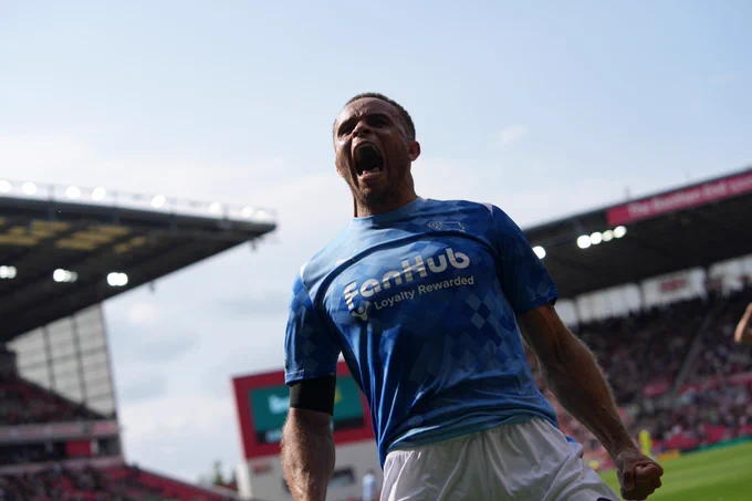 Carlton Morris celebrates after scoring Derby's opening goal of the campaign away at Stoke City.
