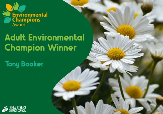 Image of daisies. Text that reads ‘Environmental Champions Award Adult Environmental Champion Winner Tony Booker’.