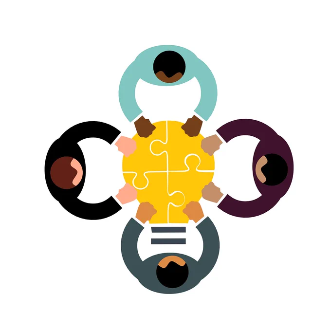 Stock graphic of four people around a table, representing cooperation.