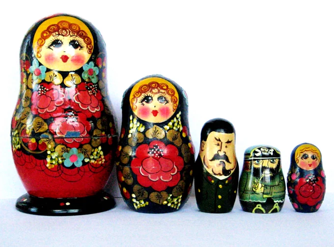 There are five parts to my novel 'Martin's Eyes'  and the deeper readers get into the narrative - spread across WW2 and the early Cold War - the closer they get to discovering the secrets at the heart of it all. 
 
Reflecting that structure, I happen to have three Matryoshka dolls - two of them bought in the Soviet Union as it collapsed into chaos in 1991. Both procured from a street vendor - one in Moscow (the forlorn-looking young lady) and the other in Sevastopol (which included Stalin, seen here, and he yields a tiny Lenin). 
 
The pirate one was made in China and I have no idea where he came from. They all have their counterparts in the story...sort of - innocent civilian victims of war, brigands (pirates ashore), while Stalin even puts in an appearance.
