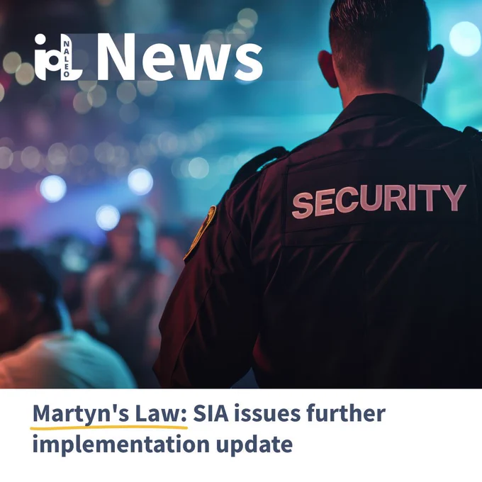 IoL News graphic with a security officer in a dark uniform standing at a live event venue, crowd and coloured lights visible in the background. Headline reads: Martyn's Law: SIA issues further implementation update.