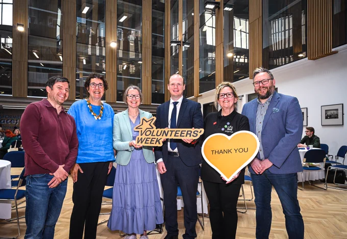 Group photo featuring Minister Lyons and volunteers at Volunteer Now’s Volunteers’ Week at Ulster University, Belfast.