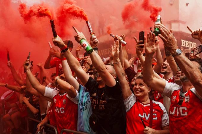 Supporters line the streets of north London.