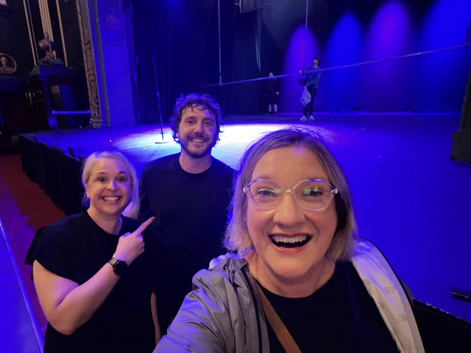 It’s Hayley, Seann and I in front of the stage (lit up blue) after the show