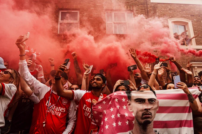 Supporters line the streets of north London.