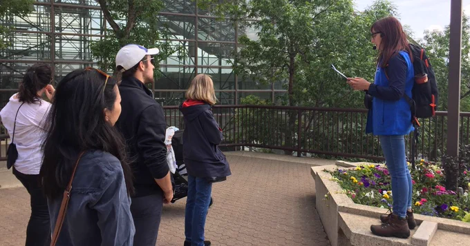 A person giving a Sustainability Tour by the Edmonton Convention Centre