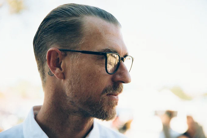 Model wearing Garrett Leight glasses