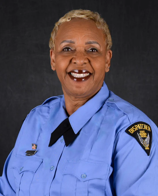 Dispatcher Carol Stinnett in her dispatcher uniform.
