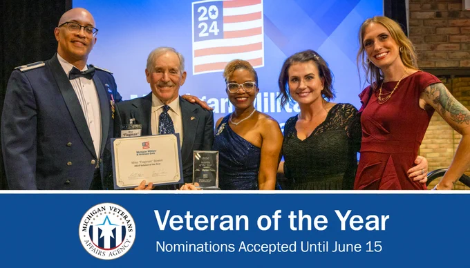 Three women and two men smiling. One man holds an award and certificate for the Veteran of the Year Award. Text: Veteran of the Year. Nominations Accepted Until June 15. With the Michigan Veterans Affairs Agency Logo.