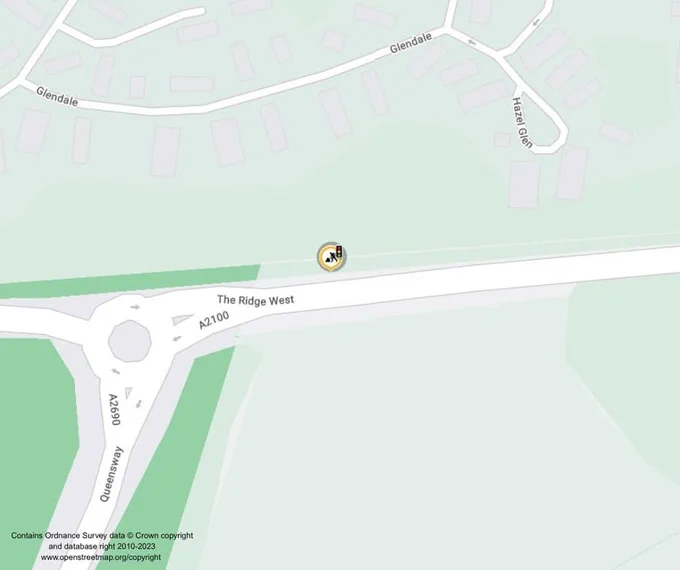 A map showing a roundabout where Queensway, A2100, and The Ridge West intersect. Nearby streets include Glendale and Hazel Grove. A pin is placed on The Ridge West.