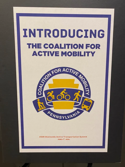 A sign that says, "Introducing the Coalition for Active Mobility".