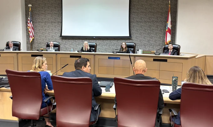 FGCC Commissioners listen to General Counsel Elina Valentine.