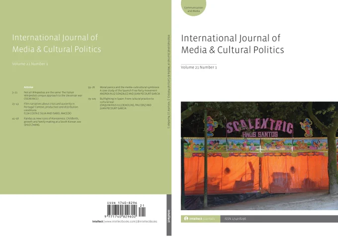 Cover of International Journal of Media & Cultural Politics featuring a colorful Scalextric amusement booth with orange curtains and cartoon characters.