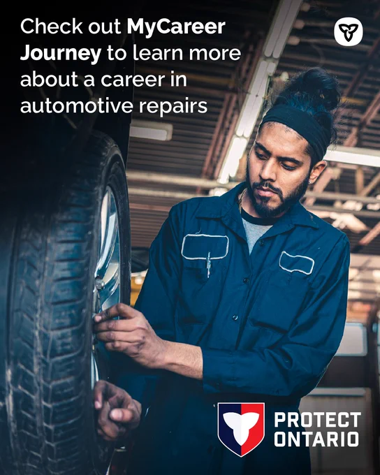 A mechanic working on a car